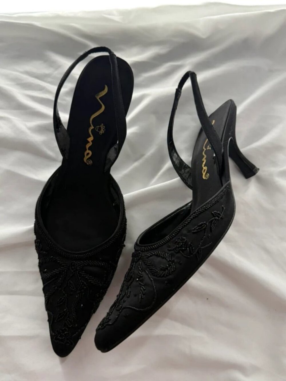 Black beaded kitten heels